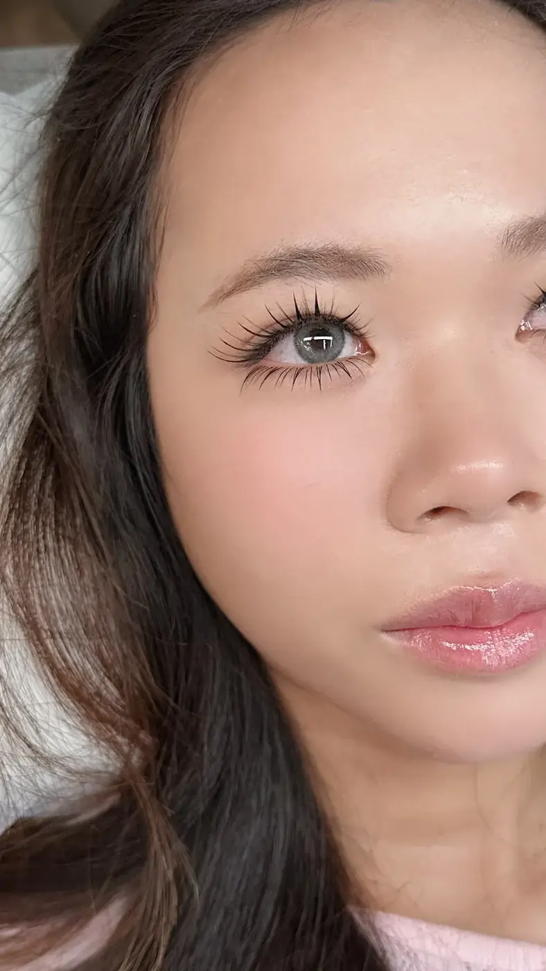 Wispy doll-style lash mapping opening up hooded Asian eyes