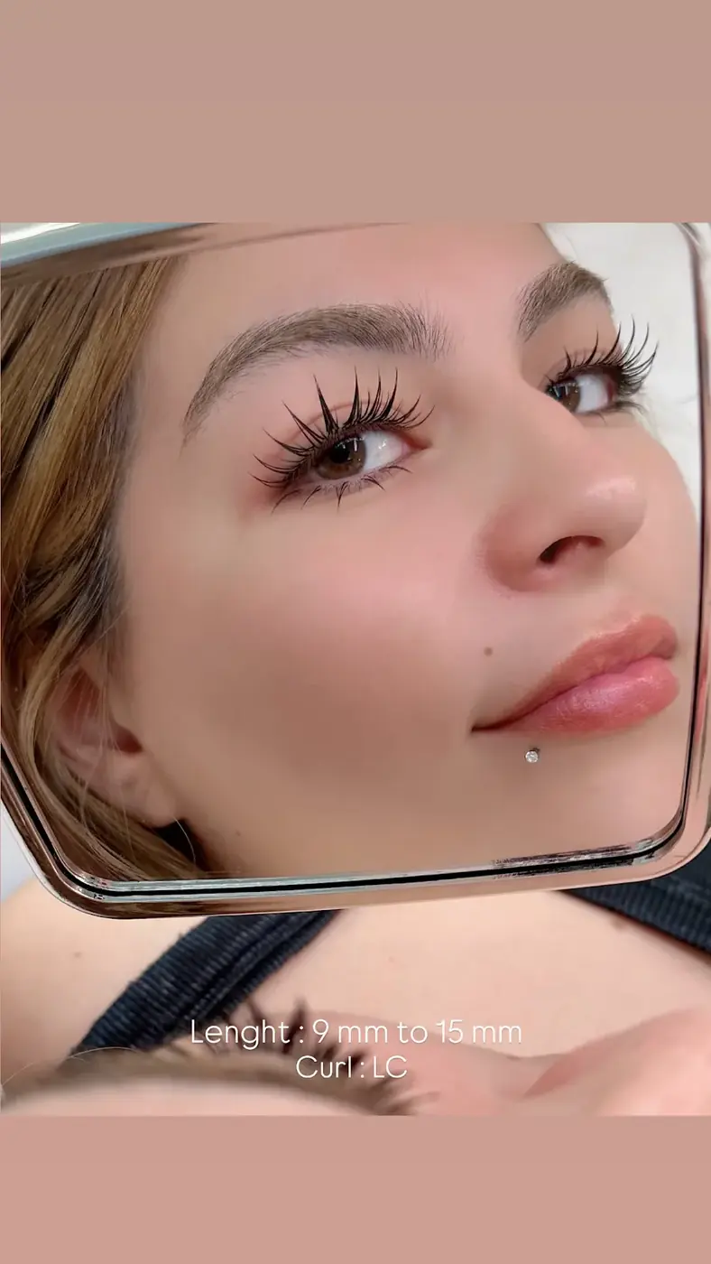 Custom lash extensions mapped to enlarge and lift Asian eyes