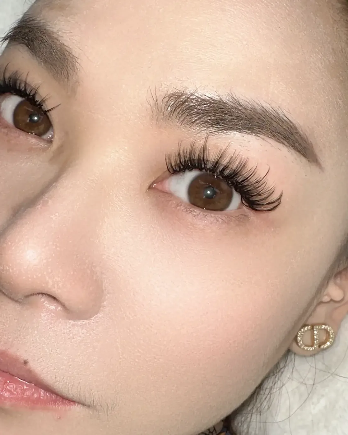Wispy textured eyelash extensions with a soft fluttery spiky effect