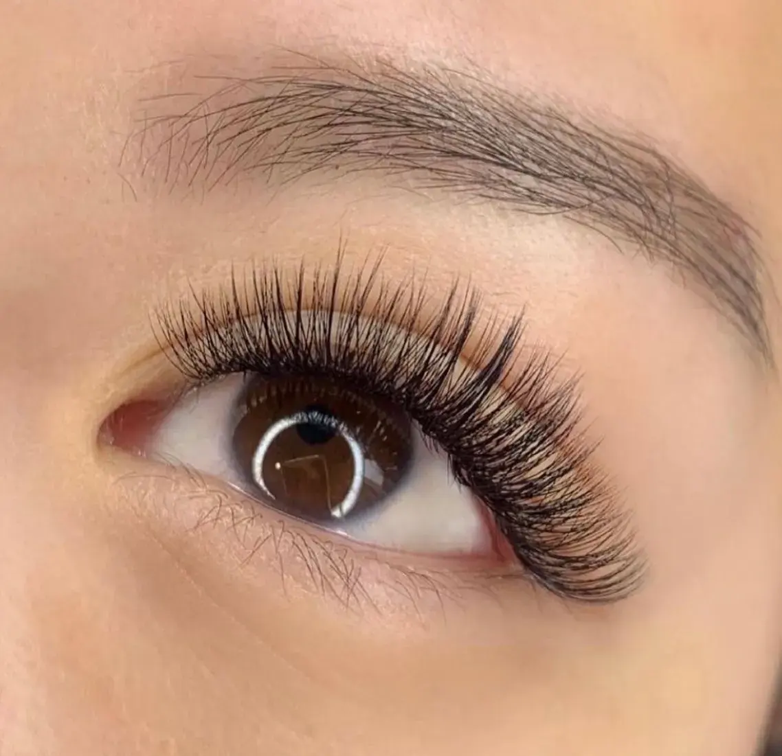 Dramatic full volume eyelash extensions with dense fluffy fans
